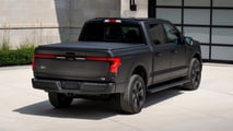 2024 F-150 Lightning  Platinum Black exterior rear three-quarter view with black tonneau cover